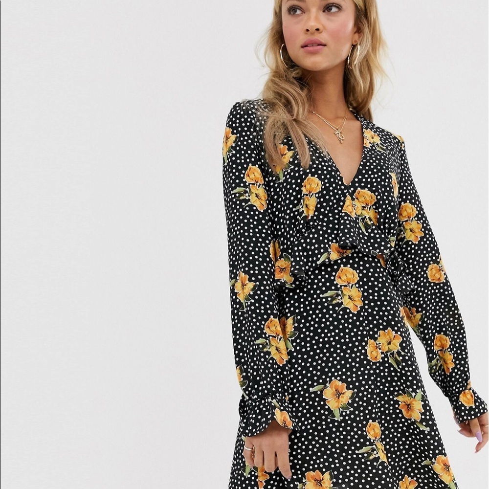 Nobody’s Child Tea Dress with Ruffle Detail In Floral Spot